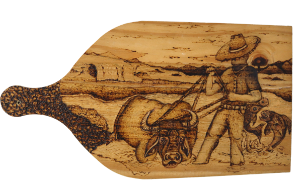 Série: Tábua de Carne – Antropofagias Amazônidas | 2024 | Instalação Pirogravura sobre Madeira
4) "BUFALOGADO" | 23 x 44 cm